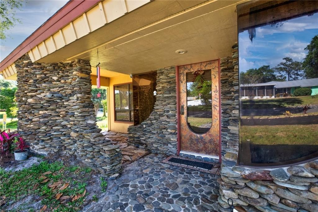 Entry way with beautiful rocks welcoming you home
