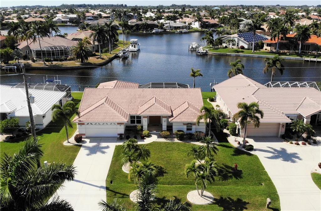 This home is literally right in the center of a large emerging canal system. WHAT A VIEW!!