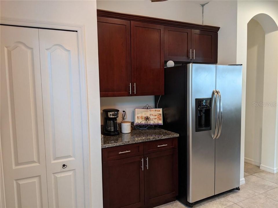 Kitchen with large closet pantry