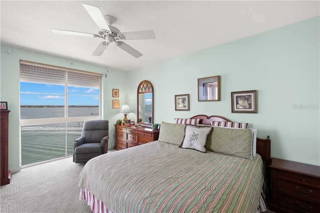 The master suite looks across the bay toward St. Pete Beach
