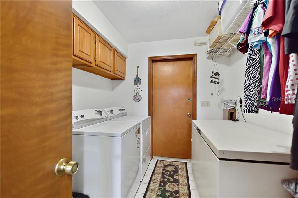 Inside laundry is 10' x 12' and has plenty of room for washer/dryer and lots of storage.