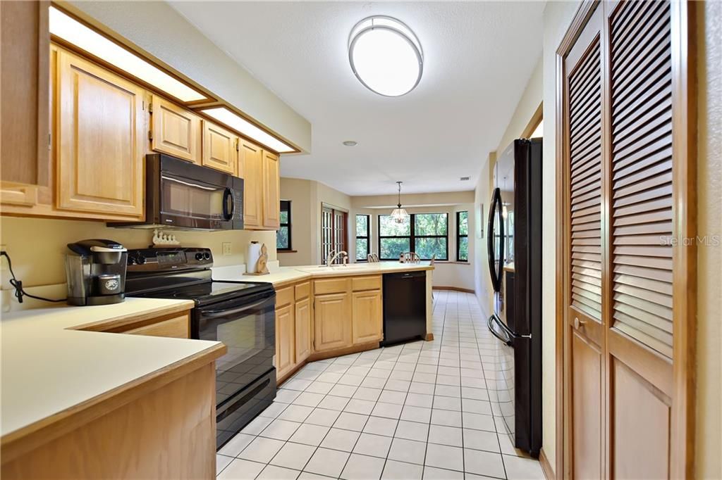 The length of the kitchen dining room is 26' and offers plenty of room for more than 1 cook to be in the kitchen.