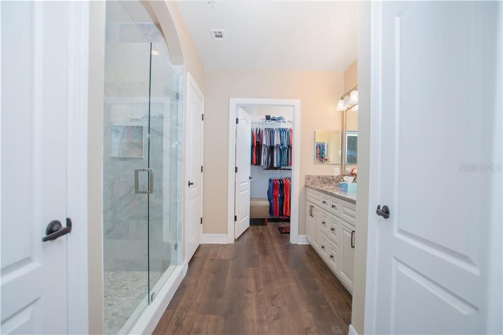 Upgraded master bath with shower, dual sinks, private commode, walk-in closet and a 2nd closet!