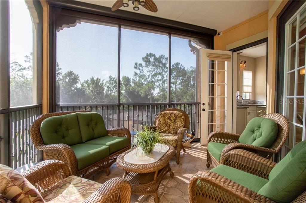 Enjoy the Florida lifestyle on the screen enclosed, tiled patio.