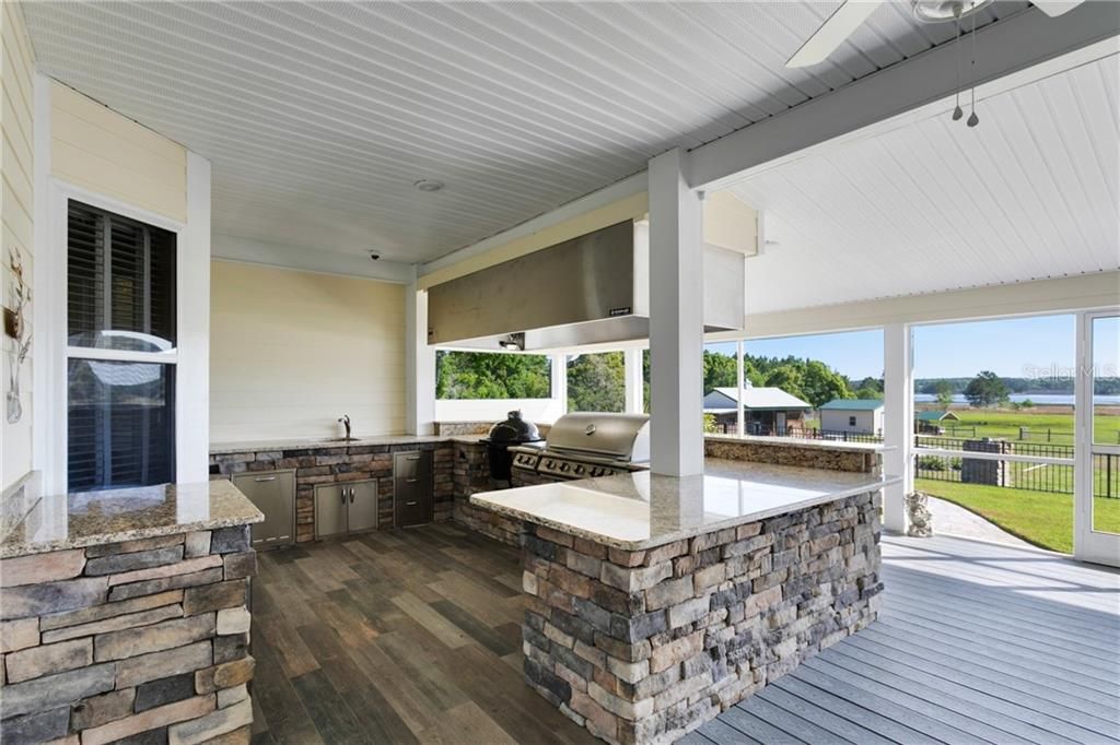 Ceramic Tile, Granite Counters, Sink, Grill, Egg; Overlooking Property and Lake
