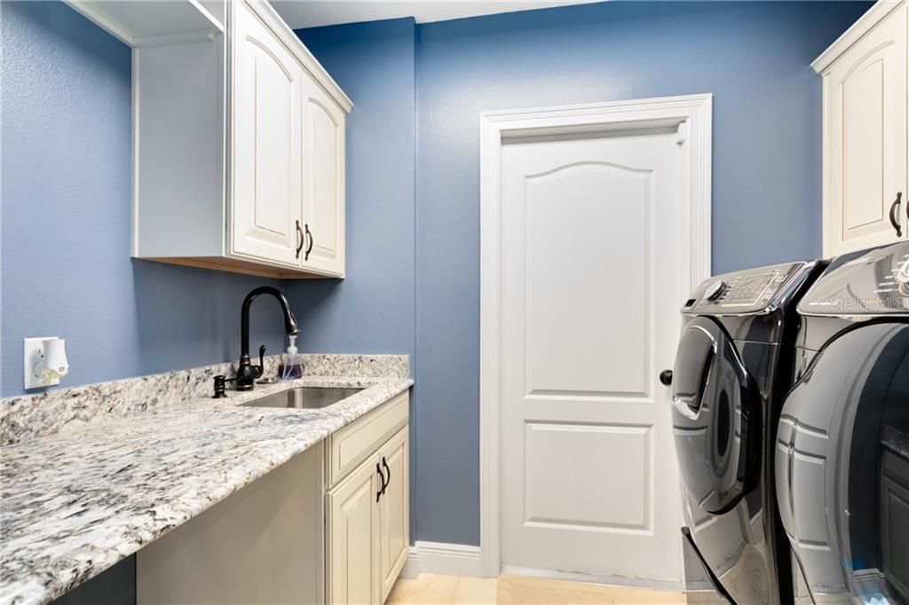 Laundry Room, Granite Counter, Sink and Cabinets