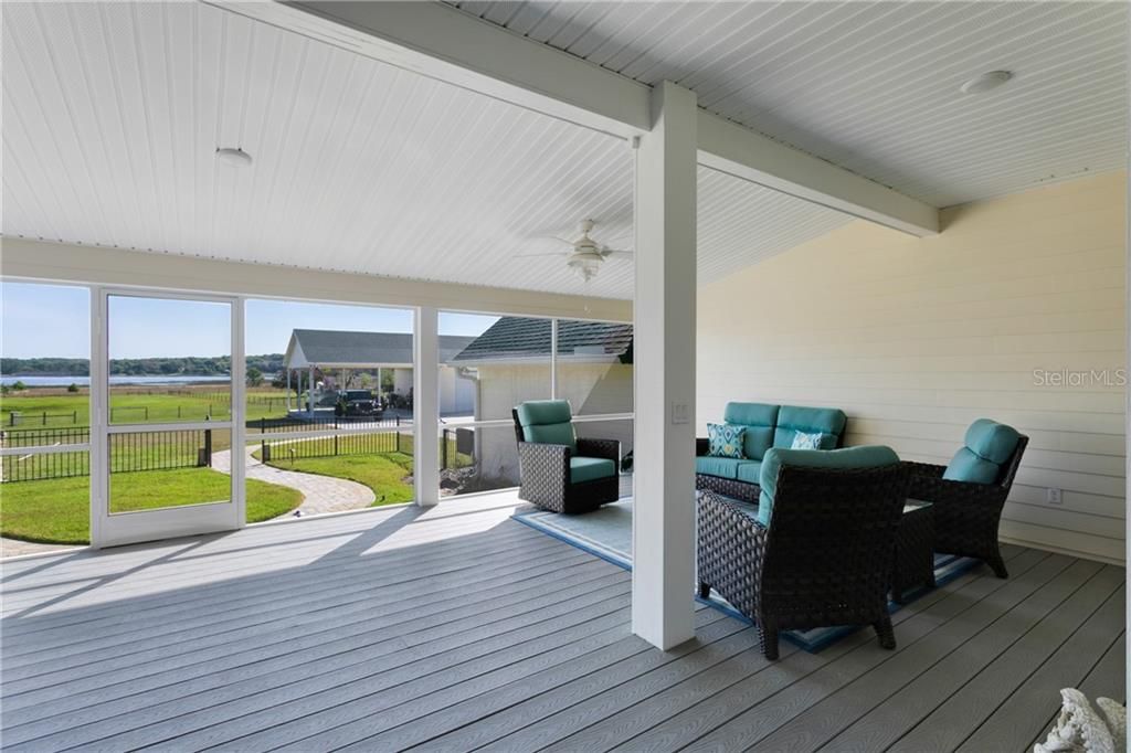 Rear Porch Overlooking Beautiful Property and Lake Elderado