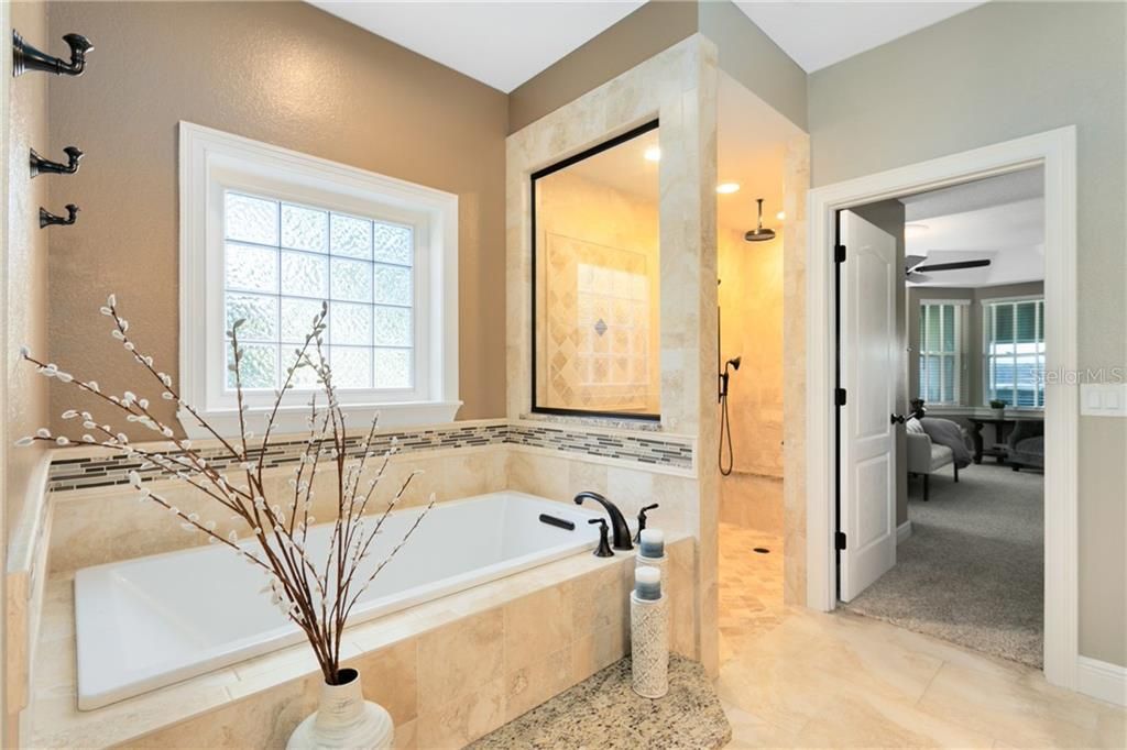 Soaking Tub and Large Walk In Shower