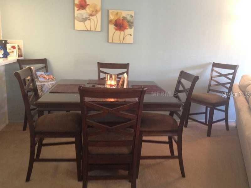 Dining area with previous tenant's furniture