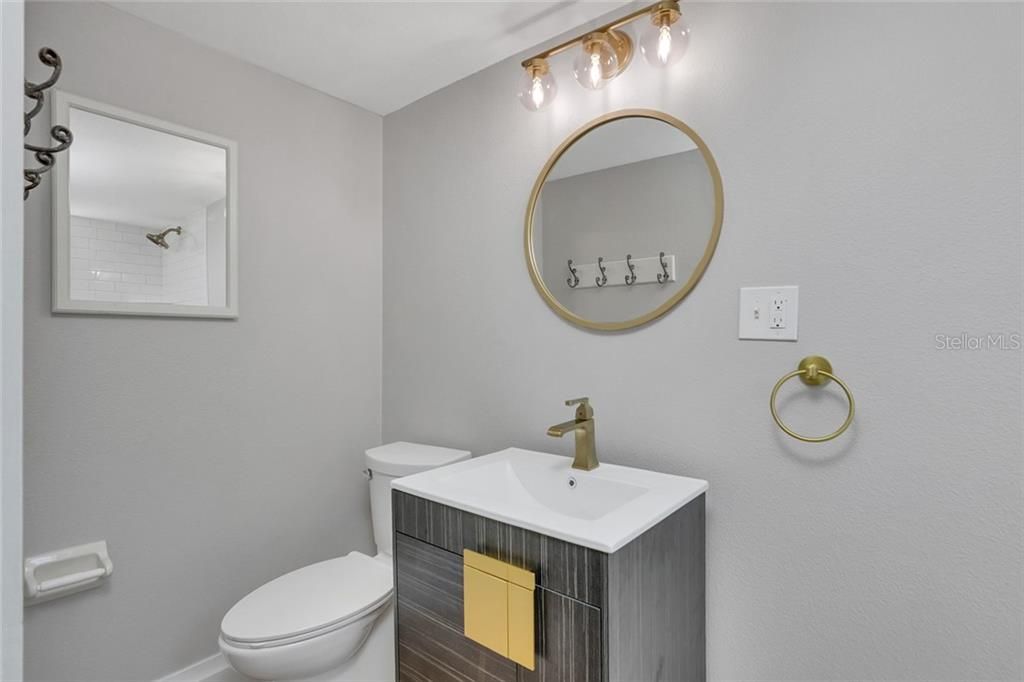 ENSUITE BATH WITH WALK IN SHOWER ON LOWER LEVEL