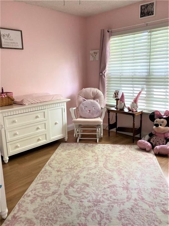 Third bedroom acts as nursery.