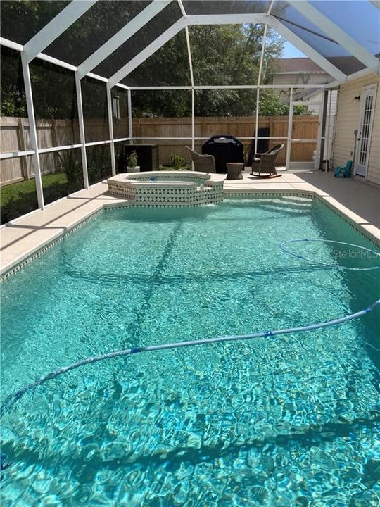 Beautiful heated pool with spa.