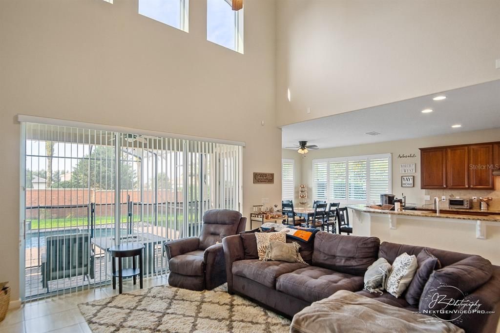 The family room has soaring ceiling and is the heart of the shared areas!