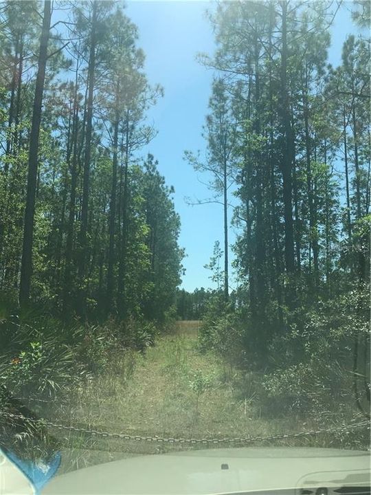 Unnamed road accessiing property from the rear.  Look for sign on left.