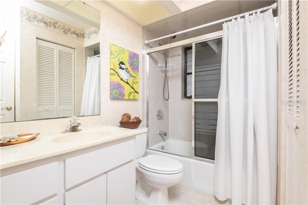 Bathroom 2 has linen closet and tub/shower combination