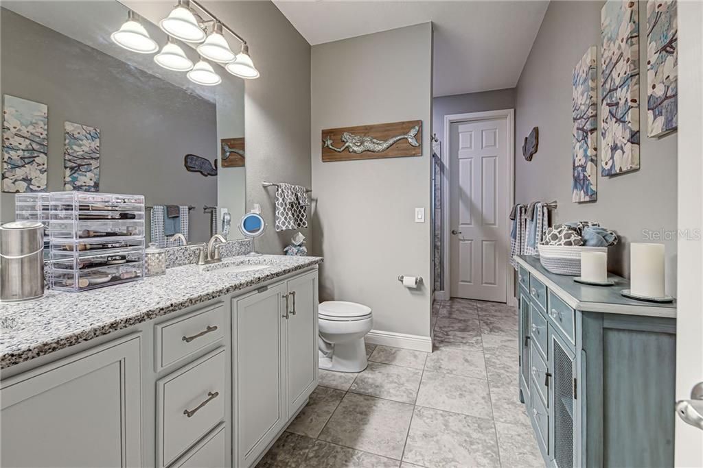 Master bathroom with dual since and large walk in shower