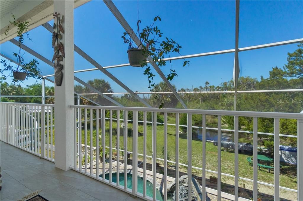 Upper Balcony Overlooking Pool and Conservation Area