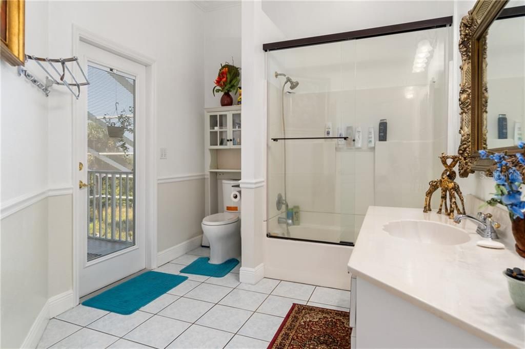 Guest Bath with French Door to Upper Balcony
