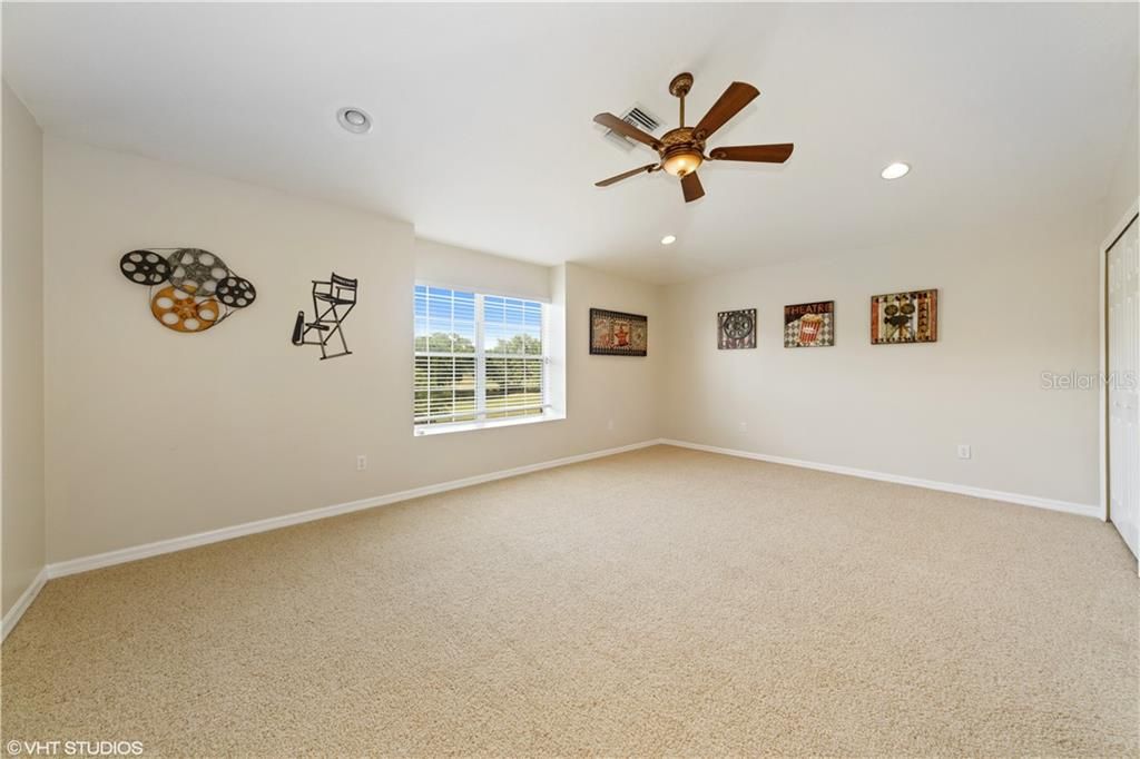 Oversized 6th Bedroom with closet, could be utilized as a theater, game room or additional living room, upstairs.