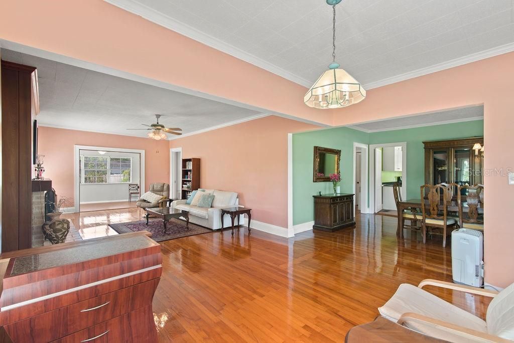 Formal living room and views into the Florida room and dining room.