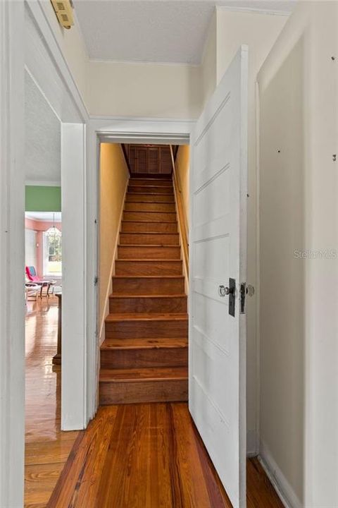 Staircase leading to upstairs guest suite.