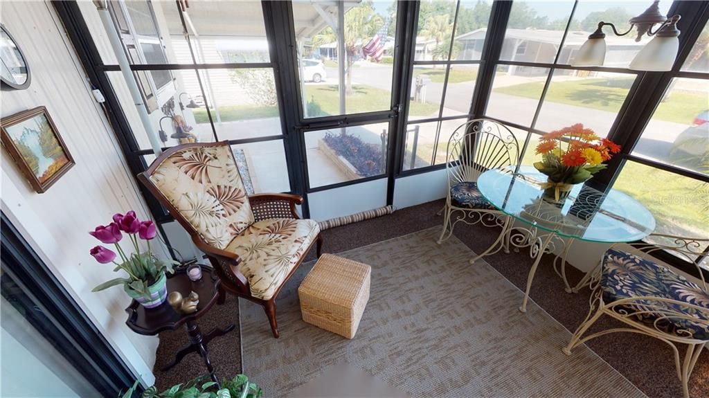 Nice sized Florida room for sipping your coffee in the morning or glass of wine in the evening.