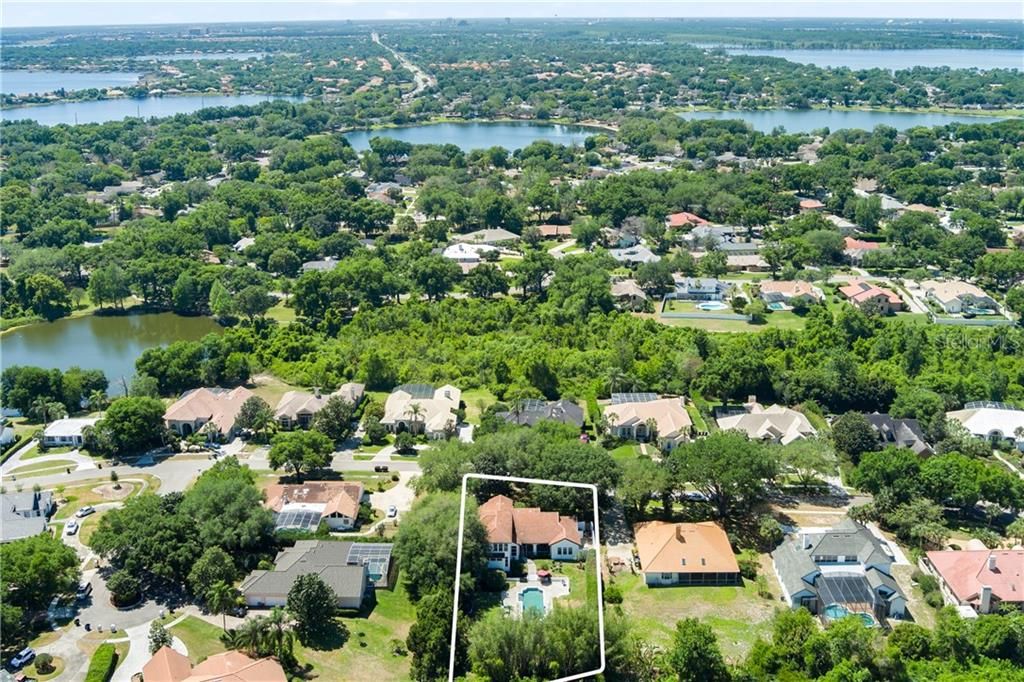 In the heart of Dr. Phillips, near the Butler Chain of Lakes, 7 minute golf cart ride to Bay Hill Golf Club, and plenty of green space!  This is a HAVEN!
