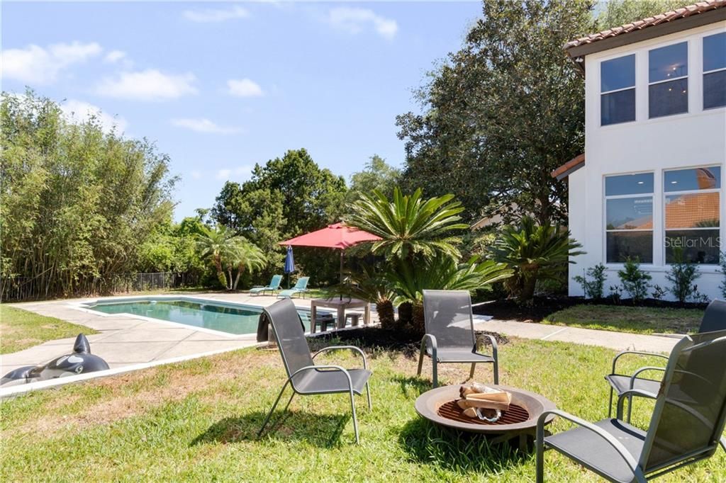 Firepit, lush landscaping, resort style pool and COMPLETE PRIVACY!