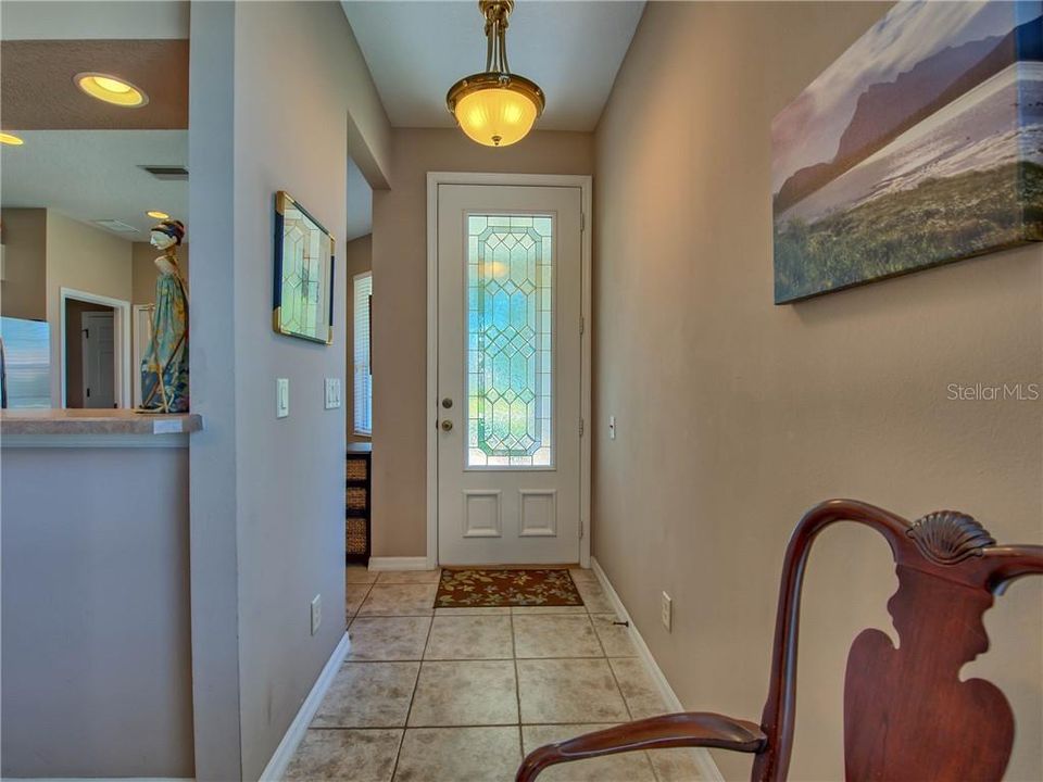 Spacious foyer with leaded glass front door!