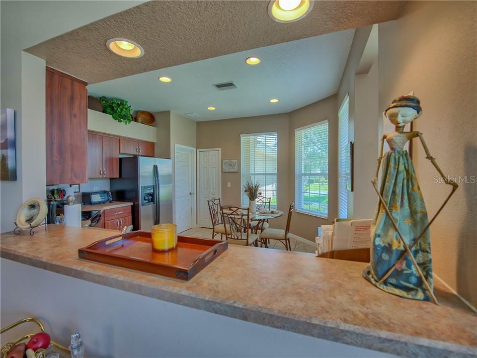 Breakfast bar with recessed lighting...great also for entertaining!