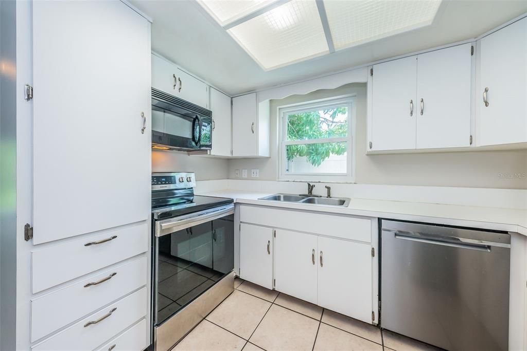 Bright kitchen with stainless appliances