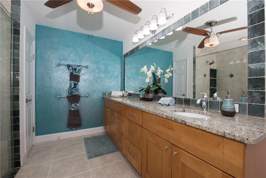 Large master bath with double vanities, walk-in shower and separate water closet.