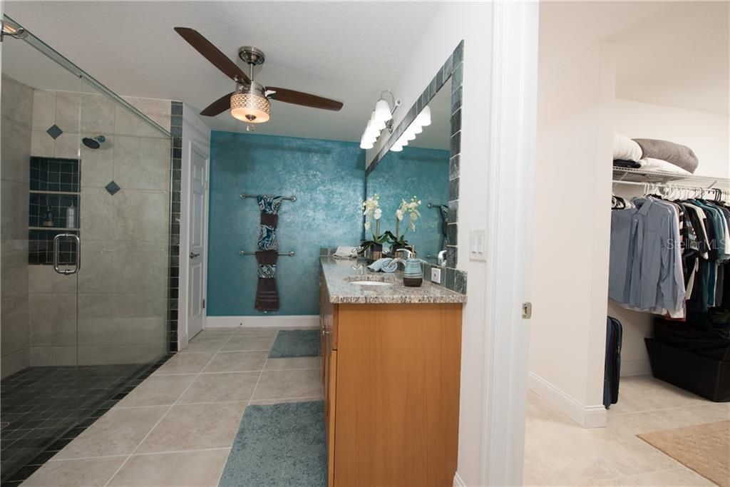 Walk-in his and her closets directly off of the master bath area.