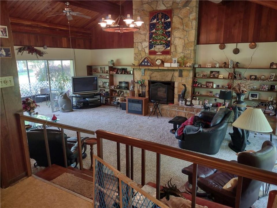 Large Living Room with so many possibilities and sliding glass doors - views of canal and Ocala National Forest