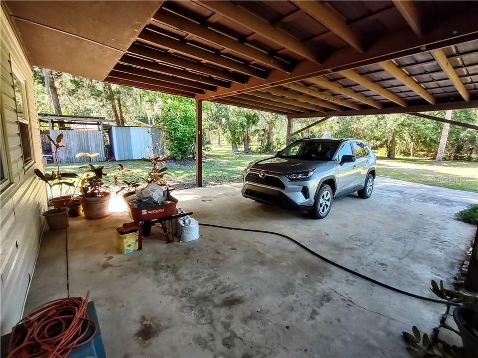 Oversized carport on front of home