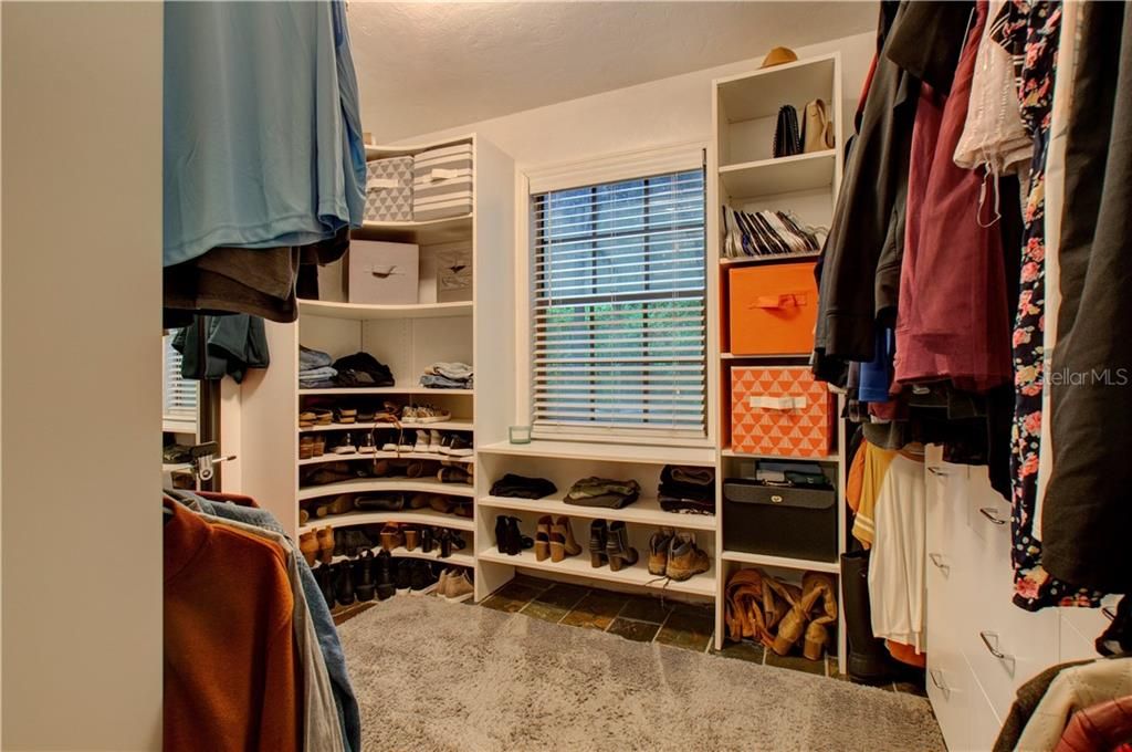 One of two master bedroom walk in closets