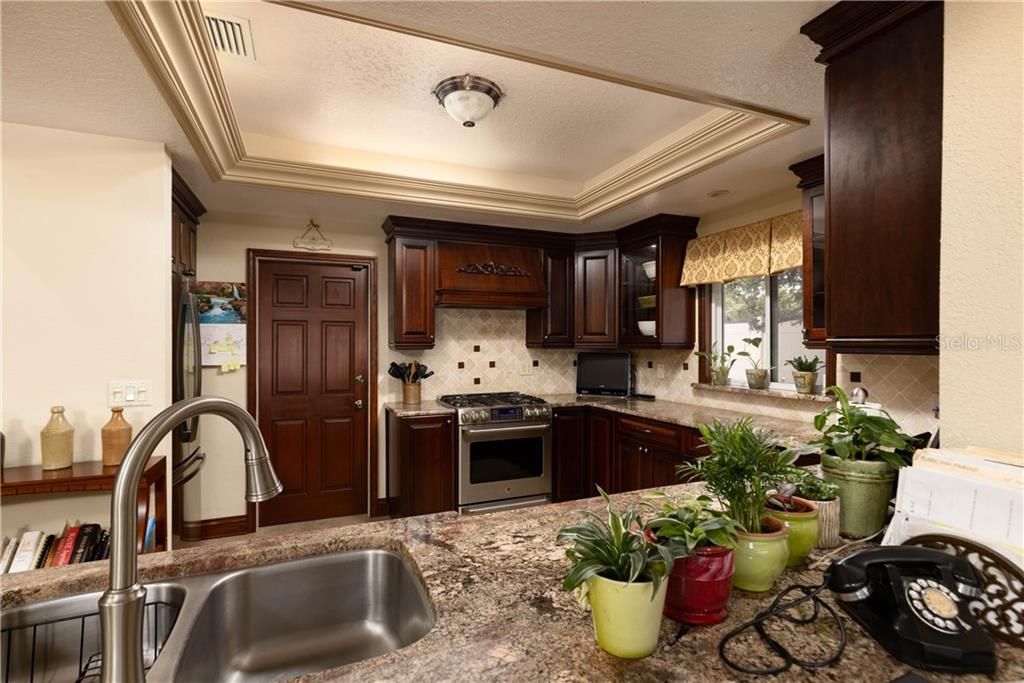 Gorgeous custom Cabinetry, Granite countertops and S/S appliances