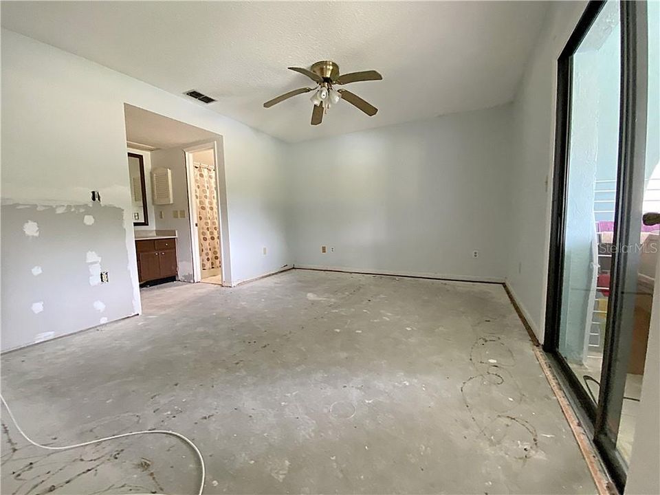 Master bedroom with sliding doors to the Florida Room