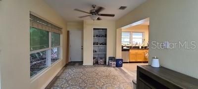 Florida Room with door to the side yard and lanai