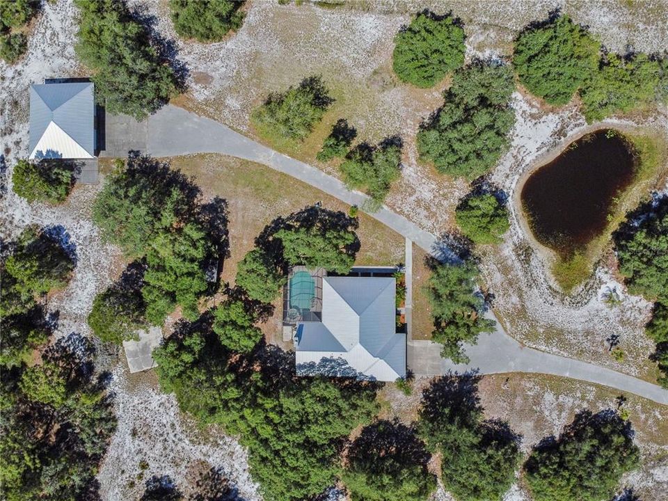 Overhead view of home and detached garage