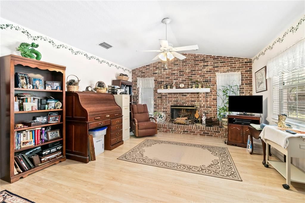 Living Room with wood-burning fireplace