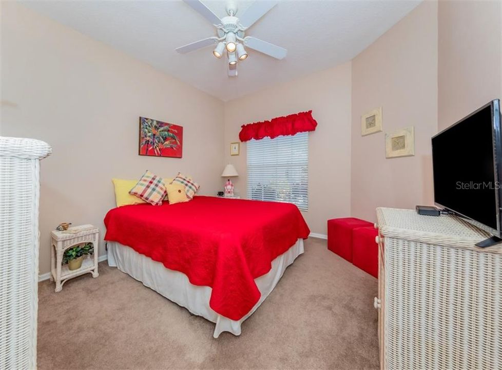 The Guest Bedroom up front in Villa with an efficient walk-in closet hiding to left!