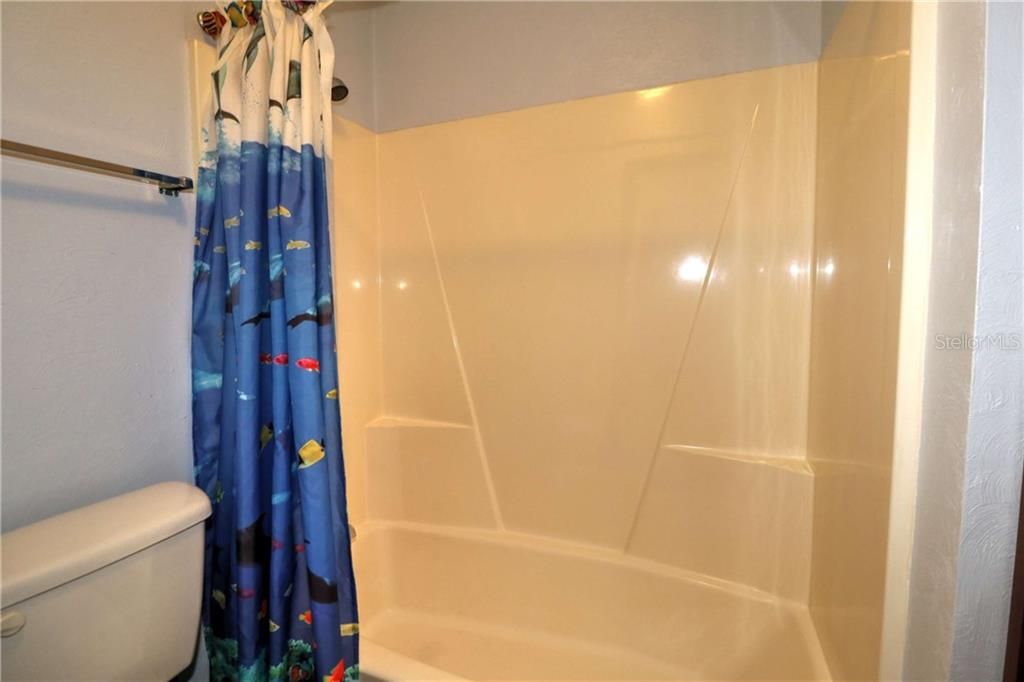 with shower/tub enclosure...