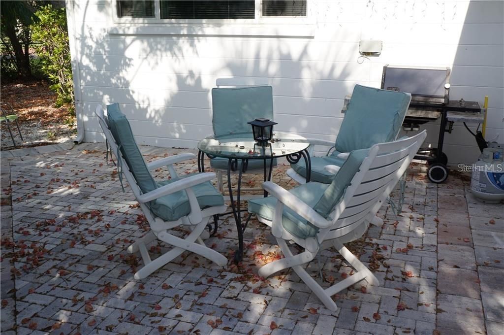 The backyard patio has pavers.  Plenty of space for entertaining outdoors.