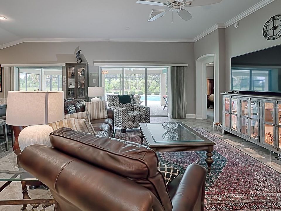 CHECK OUT THE VIEW FROM THE LIVING ROOM THROUGH THE SLIDING DOORS TO THE POOL!