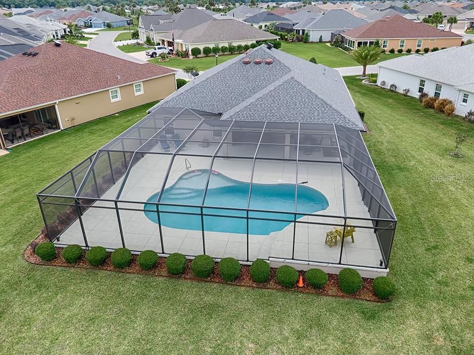 JUST LOOK AT THE SIZE OF THAT POOL AND LANAI!