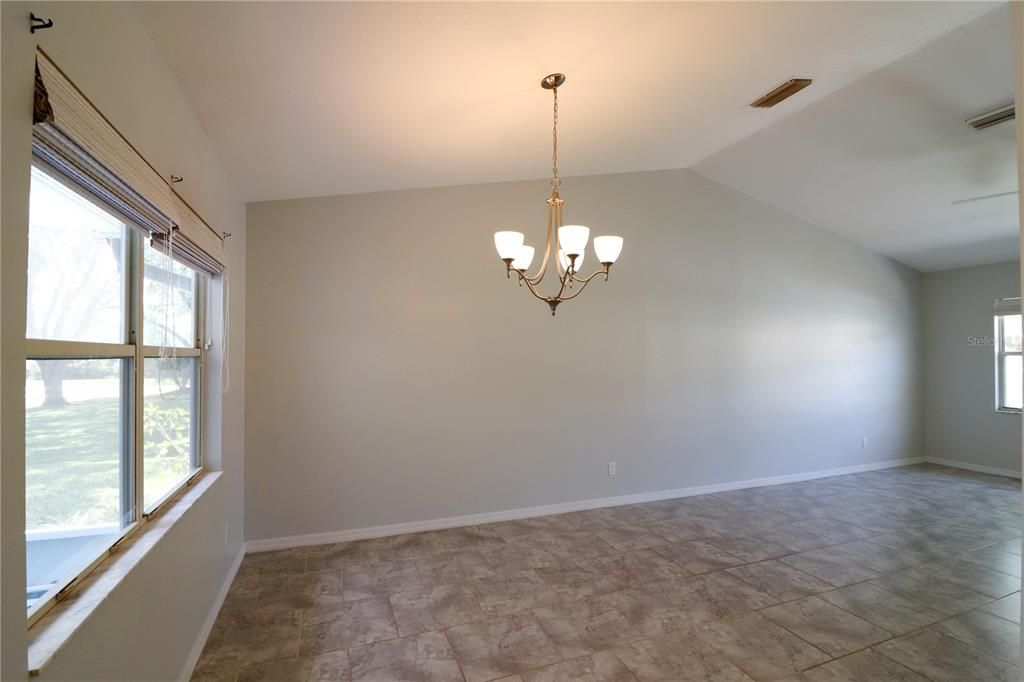 LIVING ROOM/DINING ROOM COMBO WITH CATHEDRAL CEILING