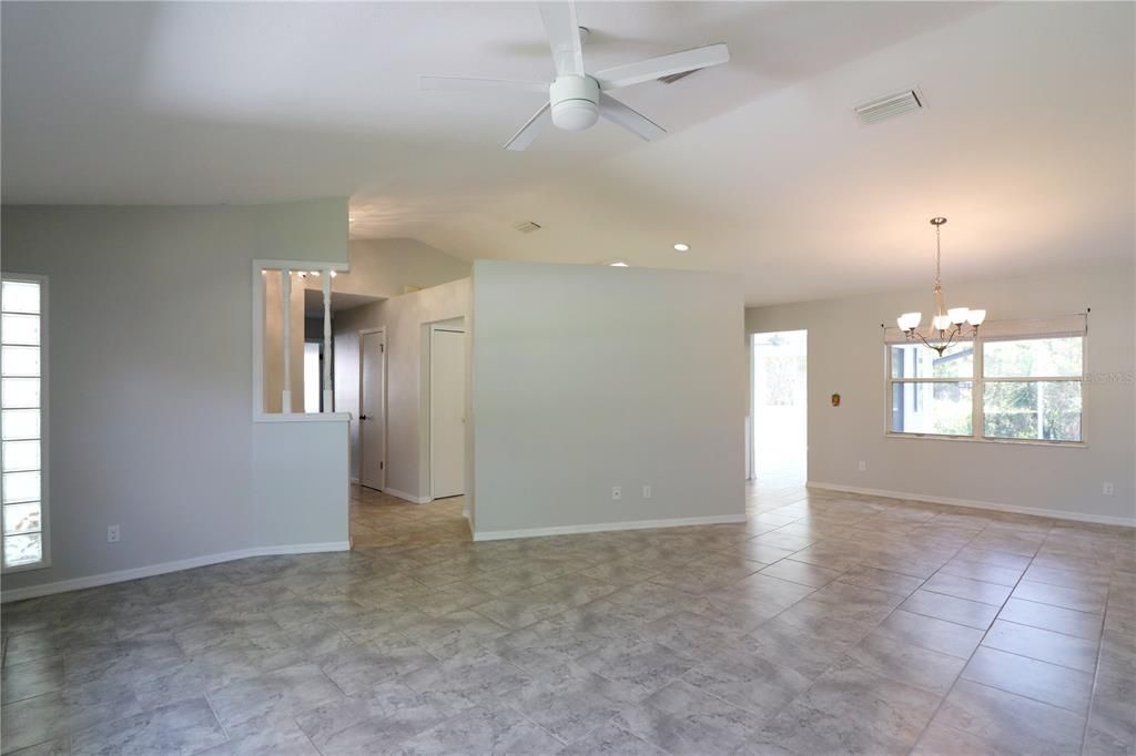 LIVING ROOM/DINING ROOM COMBO WITH CATHEDRAL CEILING