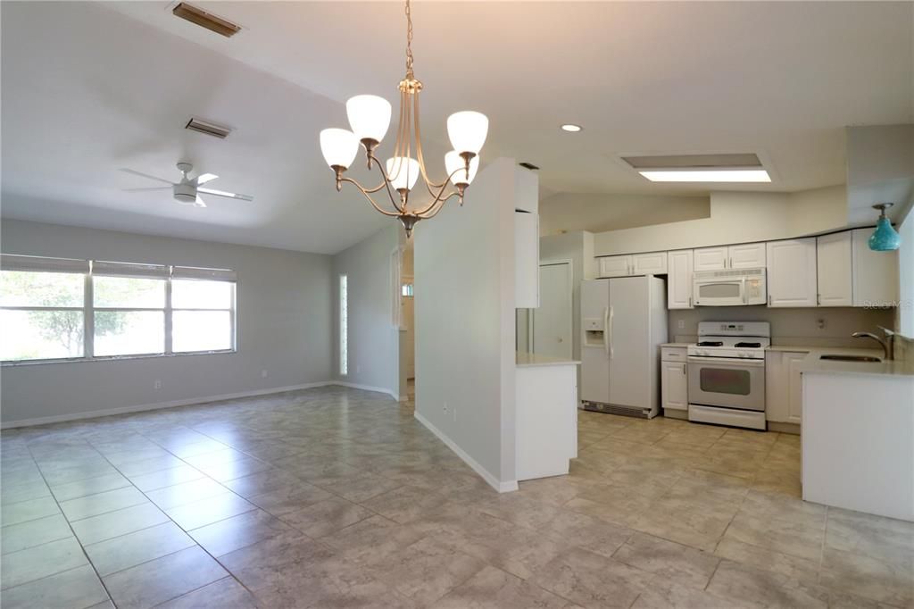 BEAUTIFUL KITCHEN WITH STONE COUNTERS, GAS RANGE AND CLOSET PANTRY