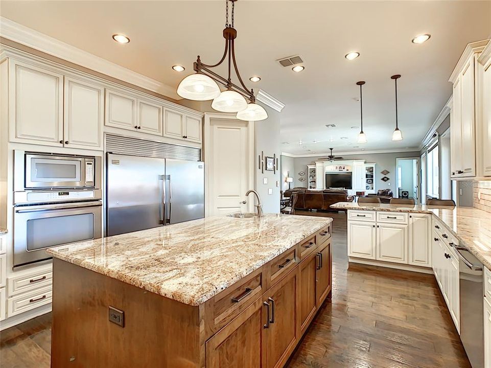 Kitchen with Granite Counter Tops and 2 Ovens